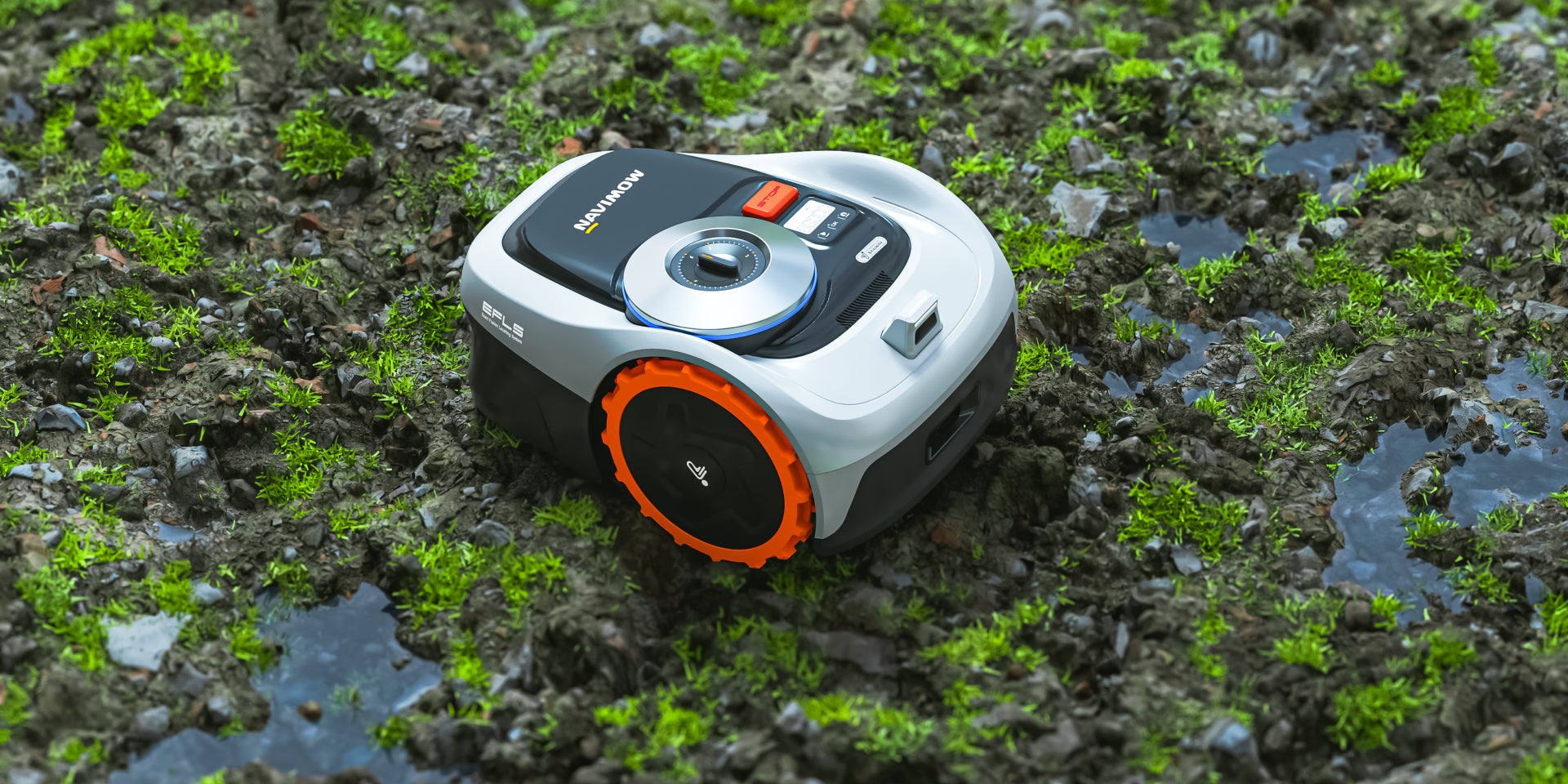 Segway Navimow robot lawn mower is on the muddy grass.
