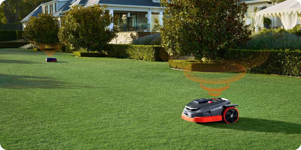 A Navimow i110N robot lawn mower mows the green lawn.