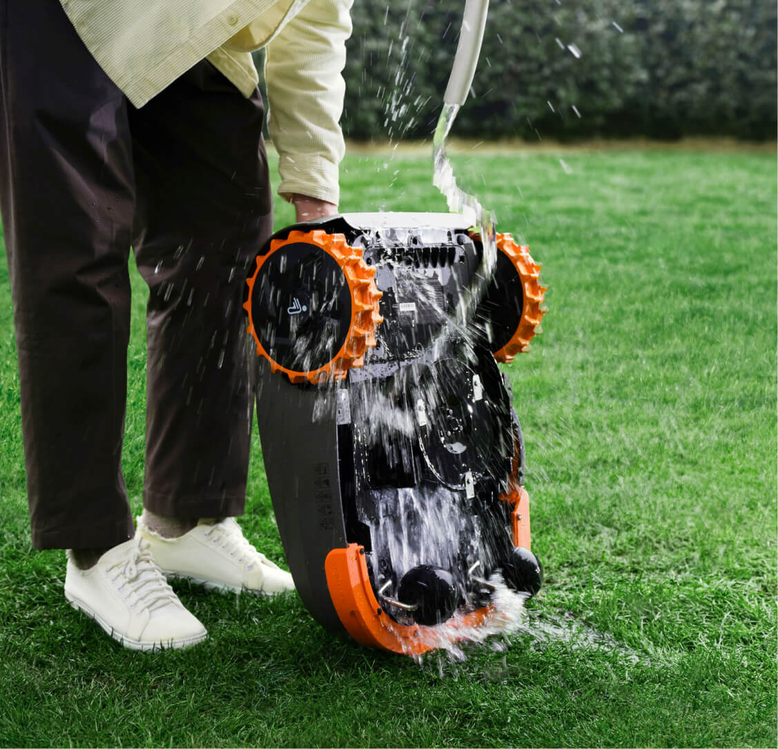 The Navimow i110E robot lawn mower is being washed now.