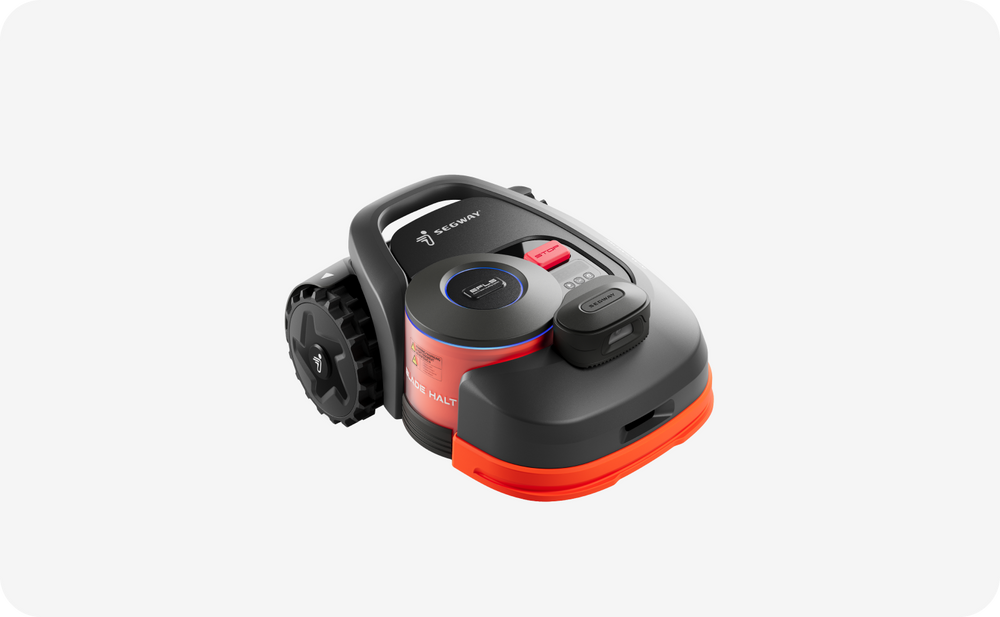 The Segway Navimow i105E robot lawn mower on white backdrop.