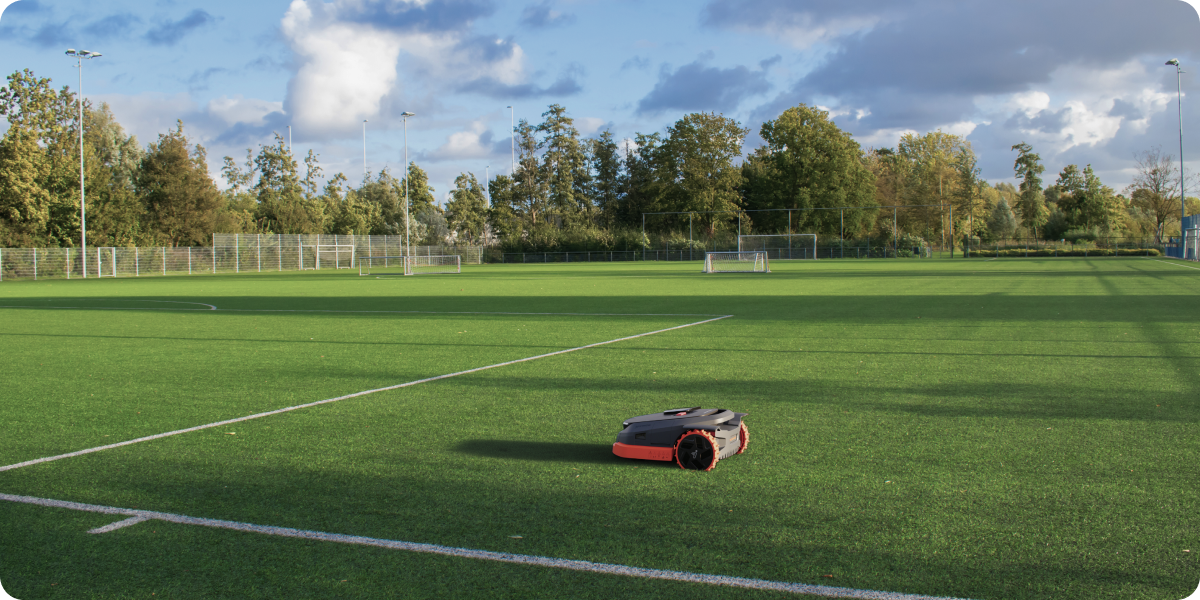 Segway Navimow i105E robot lawn mower on this soccer field.