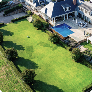 Navimow i110E robot lawn mower mowed wine glasses on grass.