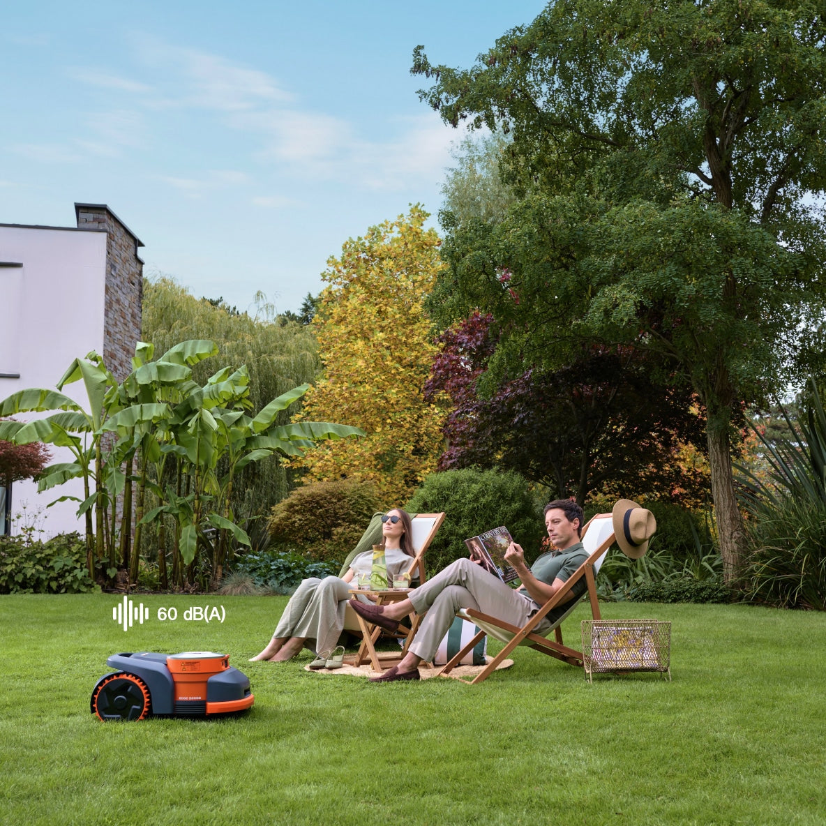 Segway Navimow H2 Series robot lawn mower on grass beside quiet 60 dBA sound graphic
