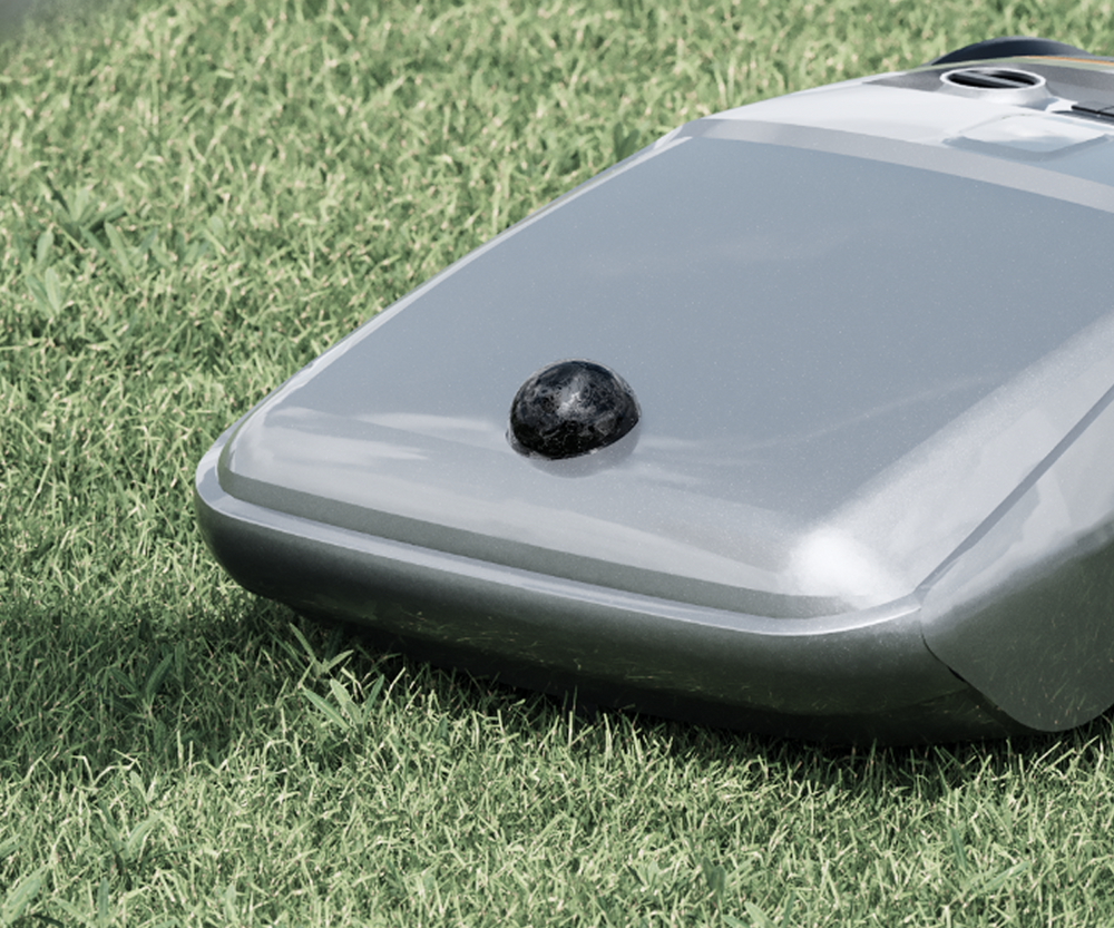 Segway Navimow i110N robot lawn mower on the lush grass.