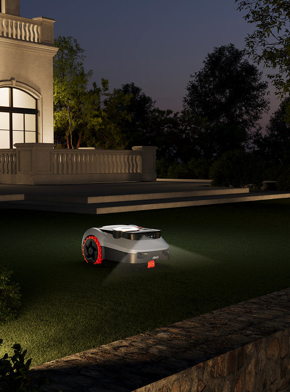 Navimow H series AWD robot lawn mower in a garden.