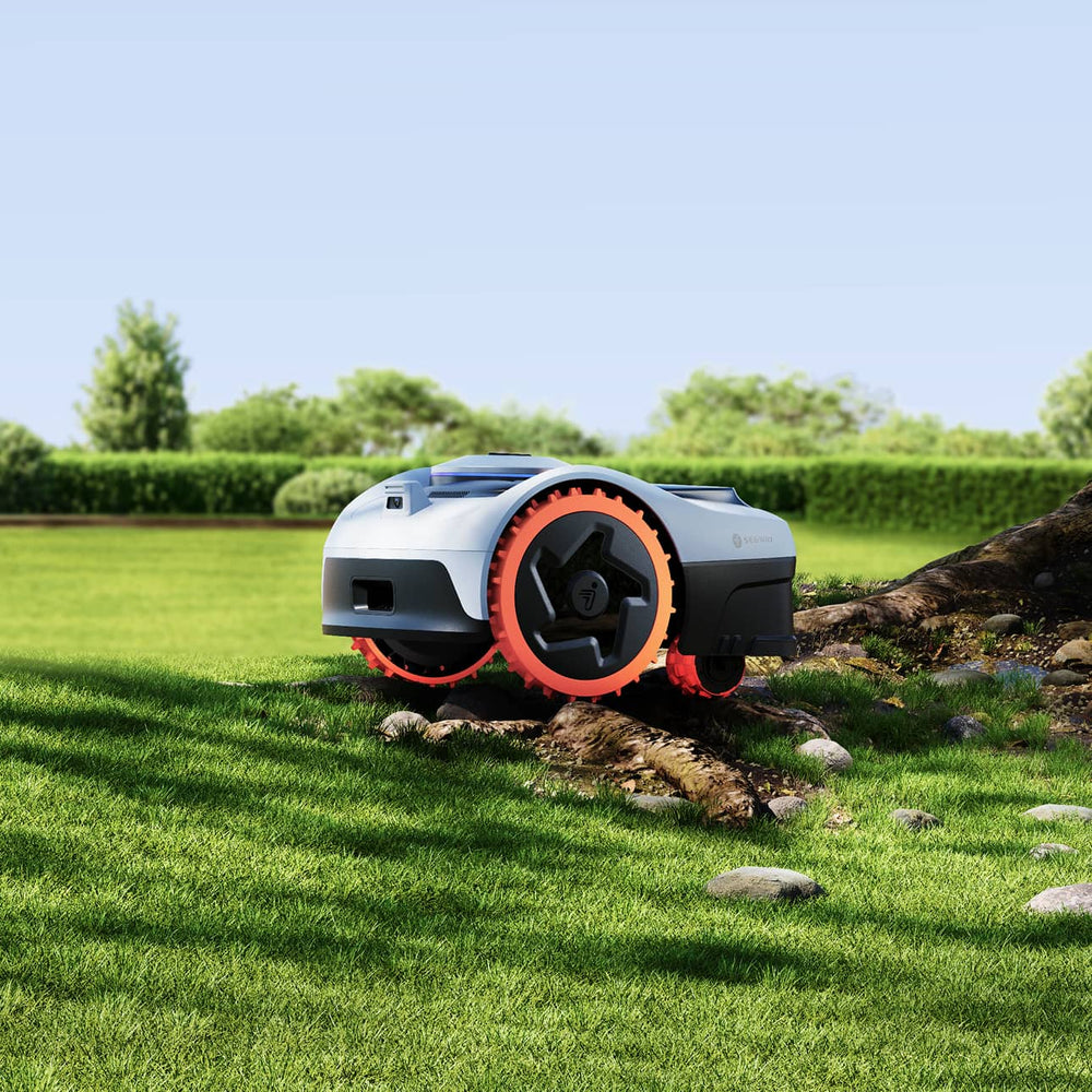 Segway Navimow i110E robot lawn mower navigating on the lawn.